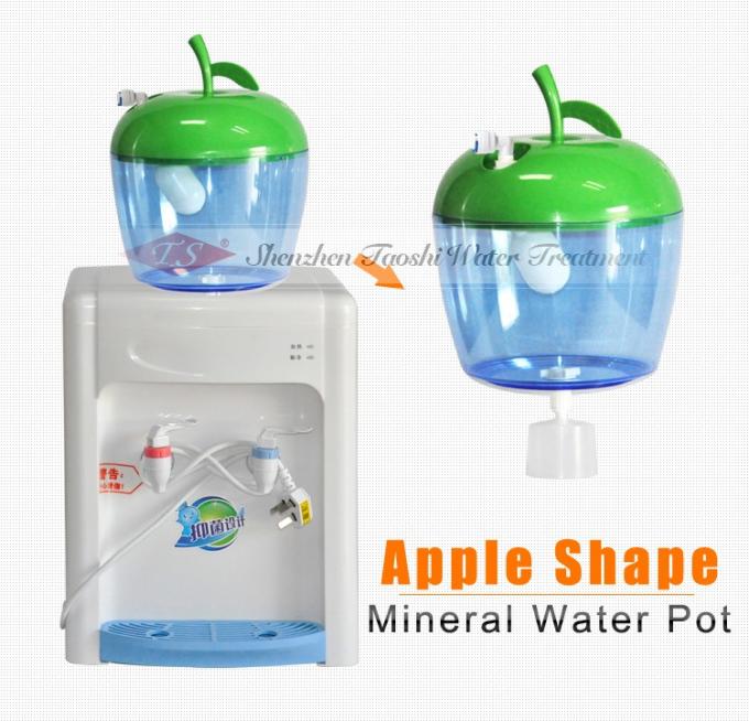 Σαφές πλαστικό δοχείο μεταλλικού νερού μορφής της Apple για το διανομέα πόσιμου νερού